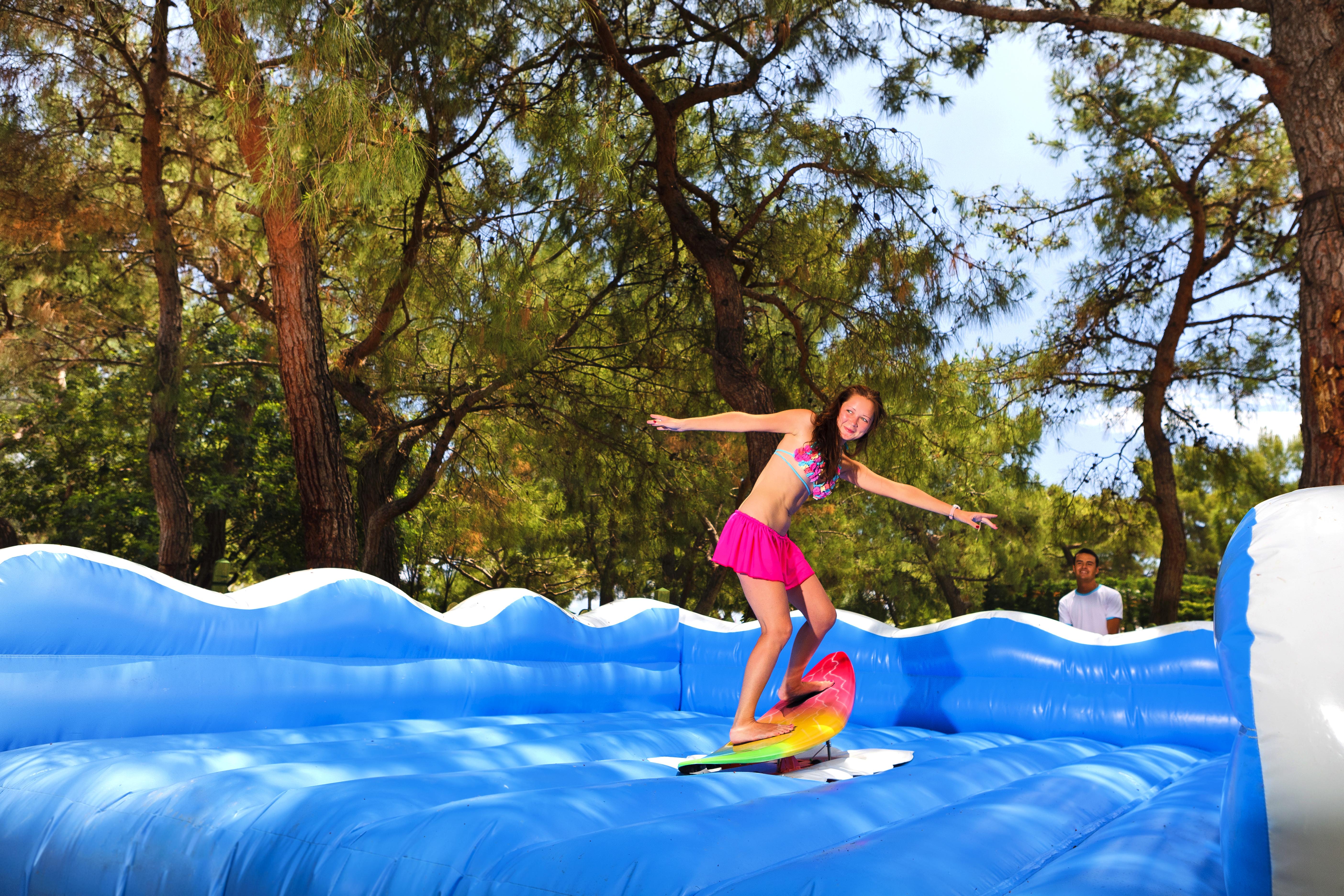 Marti Myra Hotel Tekirova Luaran gambar A girl on an inflatable water slide