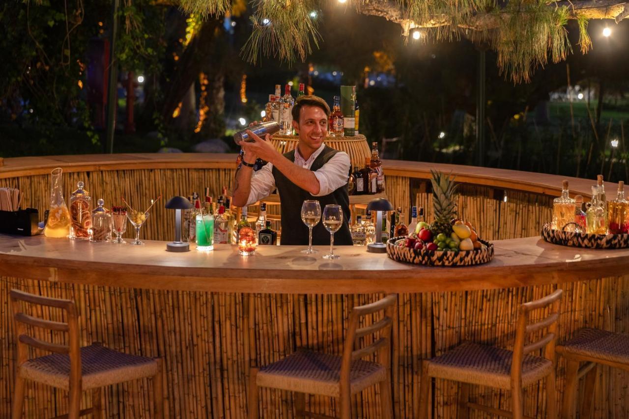 Marti Myra Hotel Tekirova Luaran gambar A bartender at work